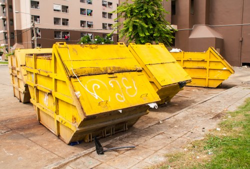 Swiss Cottage recycling center with hazardous waste containers