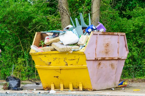 Professional muck away team removing debris from a property