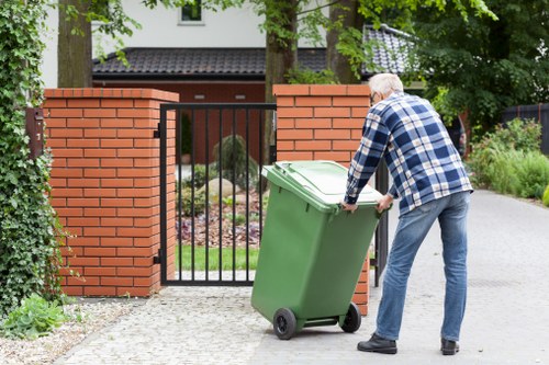 Sorting recyclable materials and household waste in skips