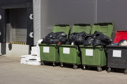 Dumpster skip being delivered to a Swiss Cottage home